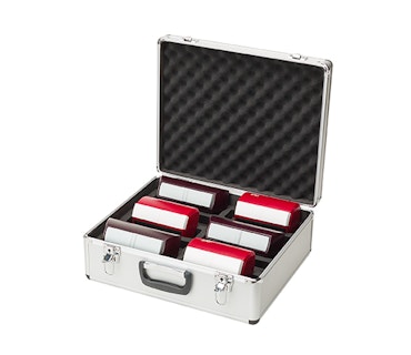 case with chess clocks inside in silver colour with black inside and handle
